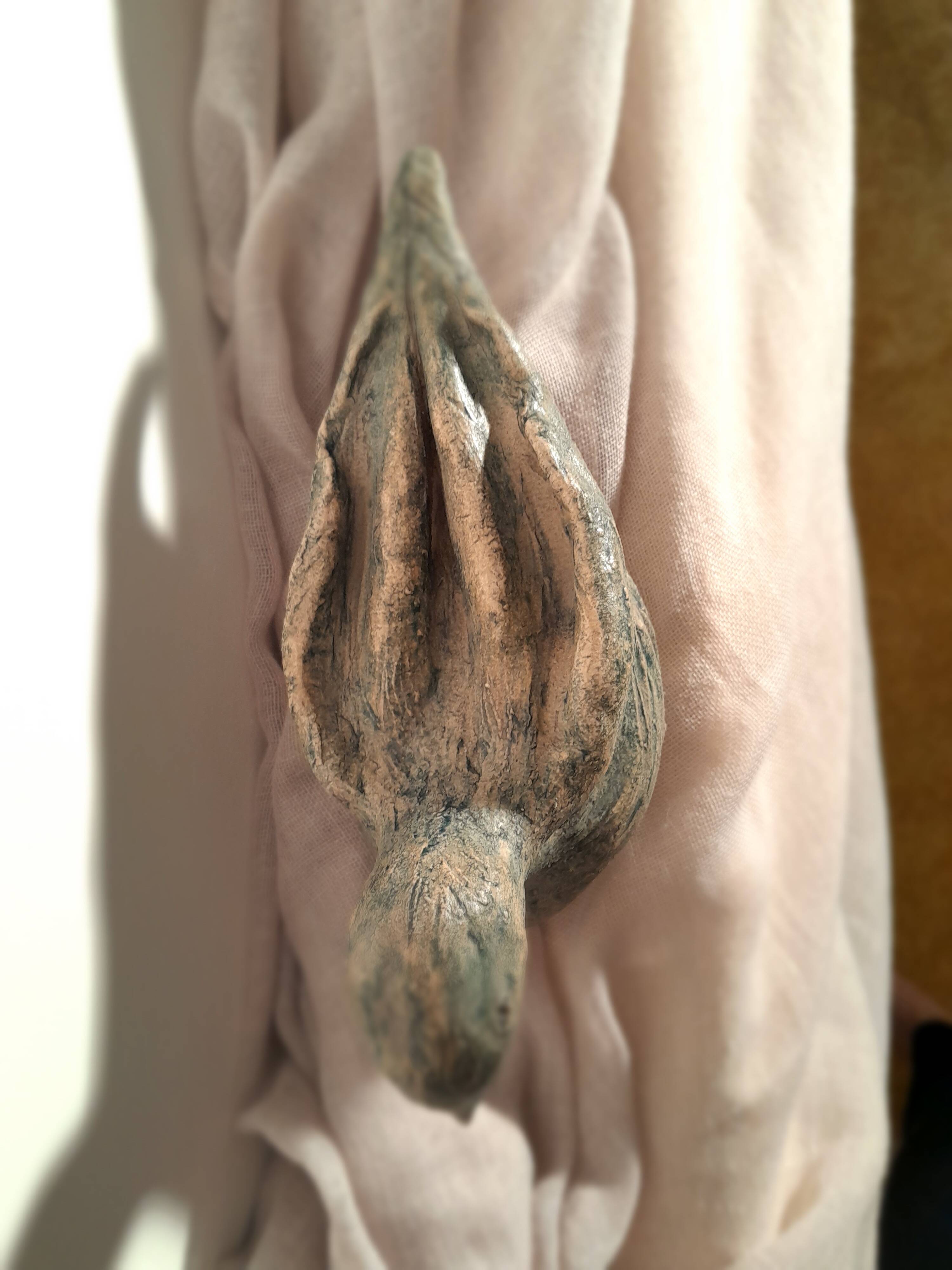 Signed bird sculpture