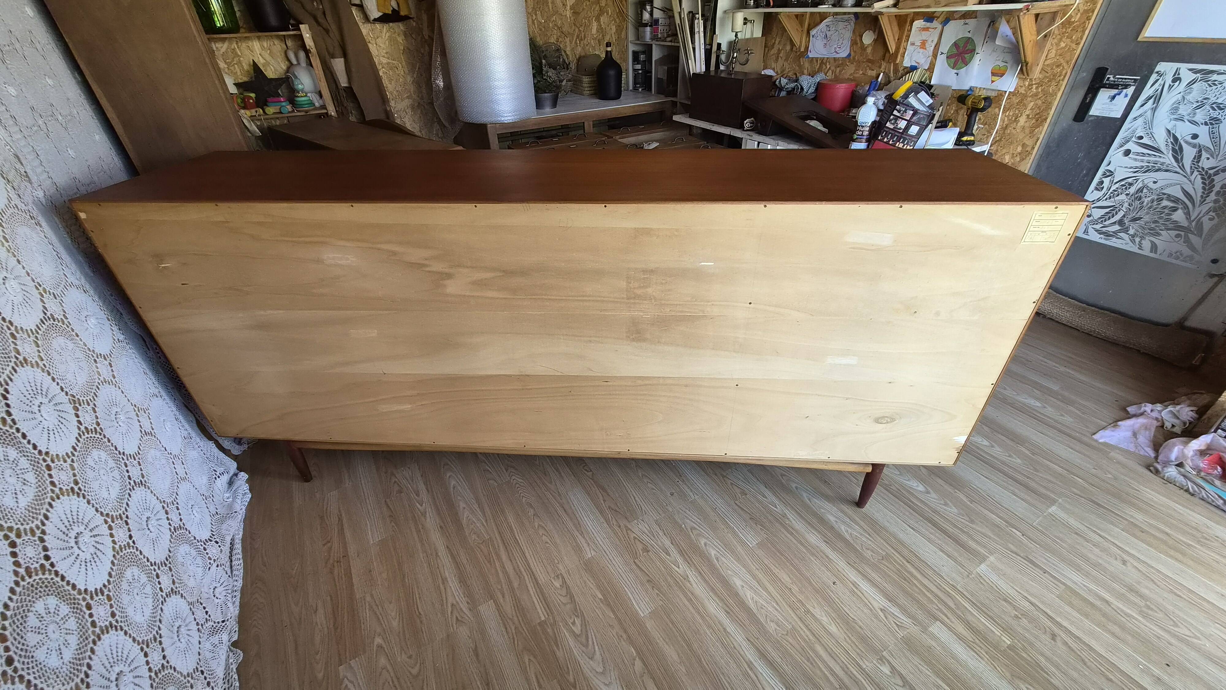 Scandinavian threading Swiss teak model 6002 dated 1961.
