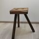 Old wooden stool tripods
