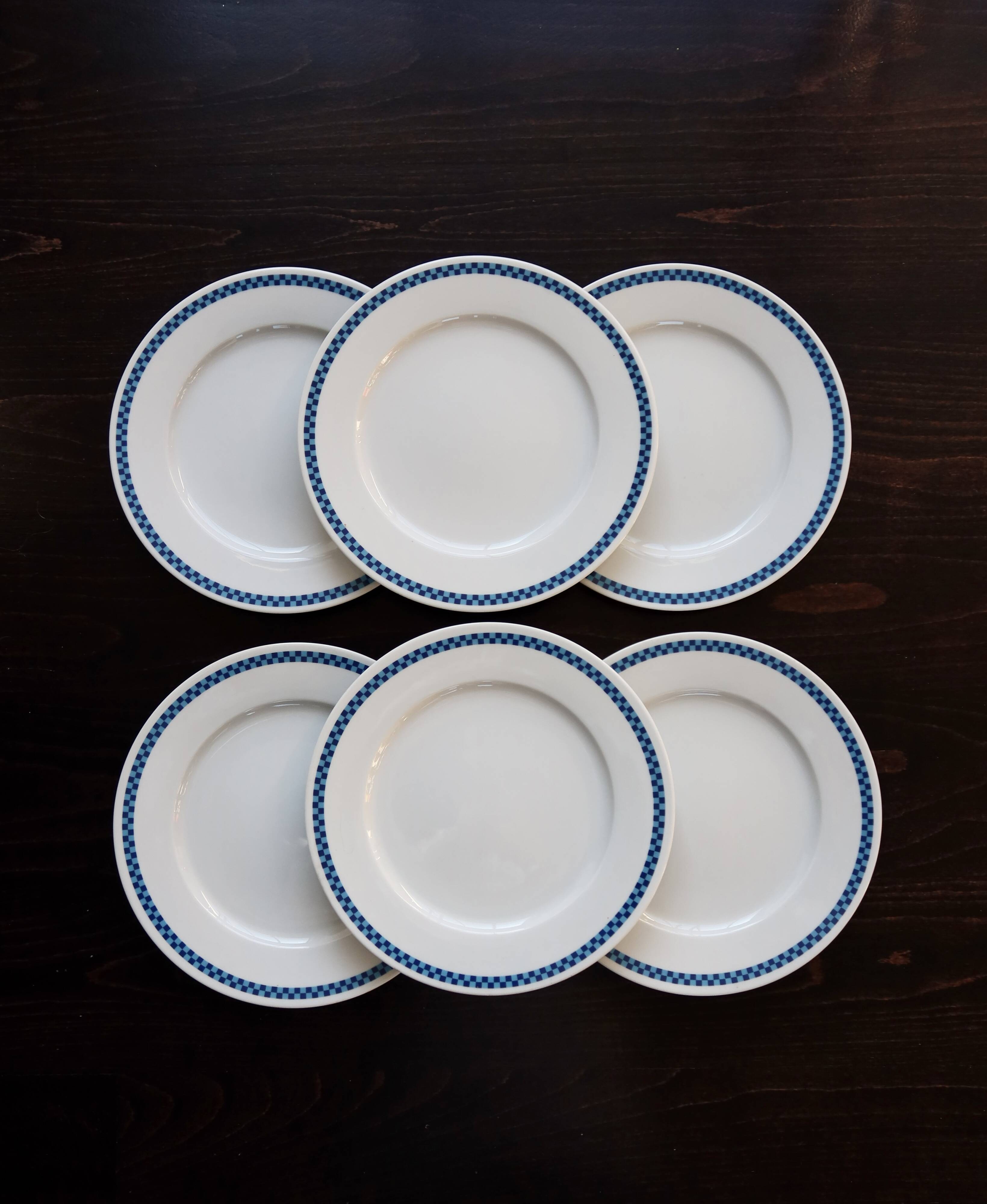 6 vintage Lustucru porcelain plates with a blue checkerboard pattern