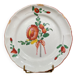 Easternth century earthenware plate, ribboned floral decoration