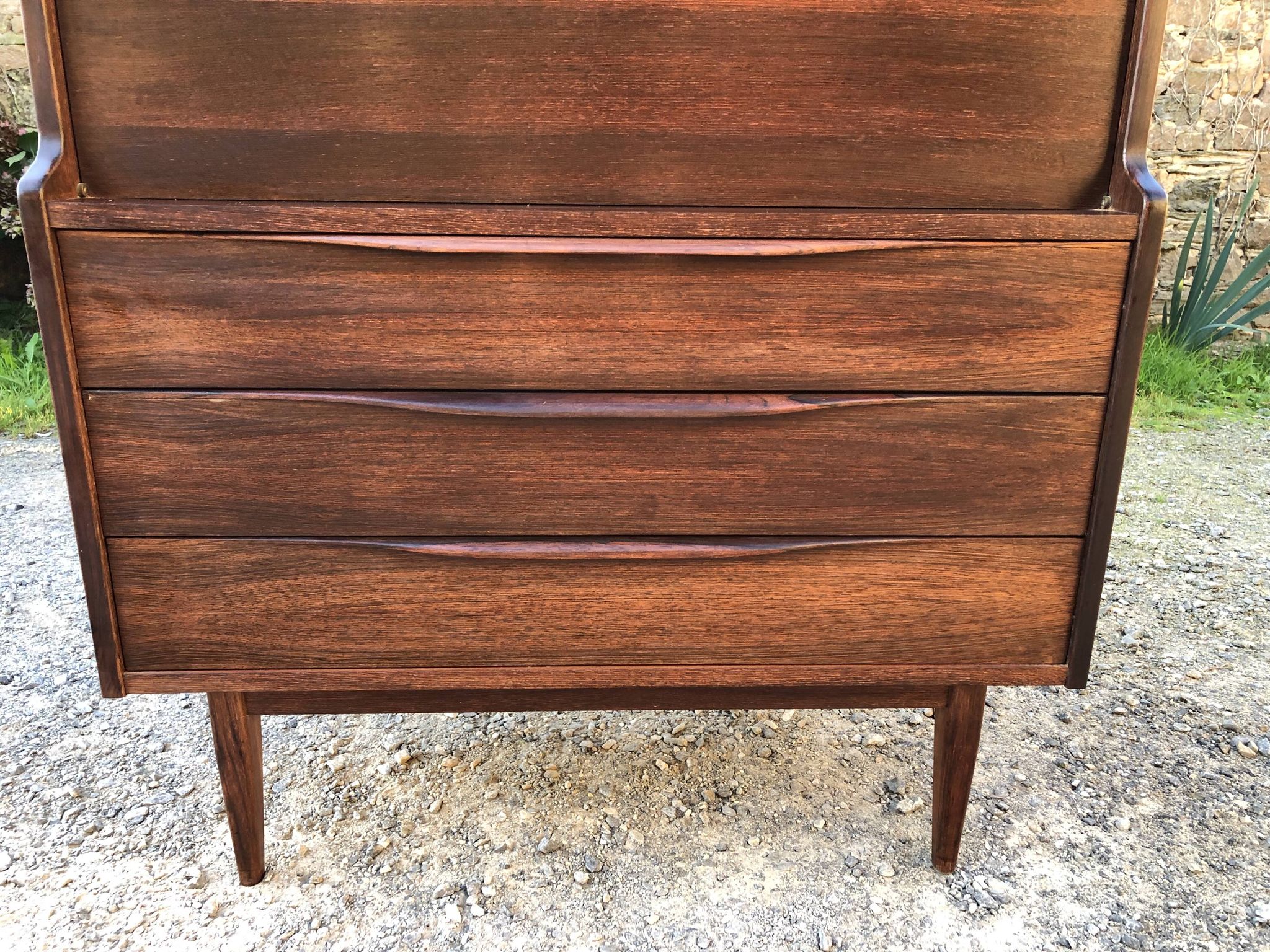 Vintage Scandinavian secretary in rosewood with drawers featuring fin-style handles.
