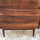 Vintage Scandinavian secretary in rosewood with drawers featuring fin-style handles.