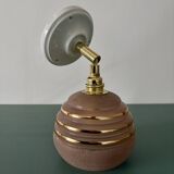 Vintage globe wall light in frosted pink and gold glass.