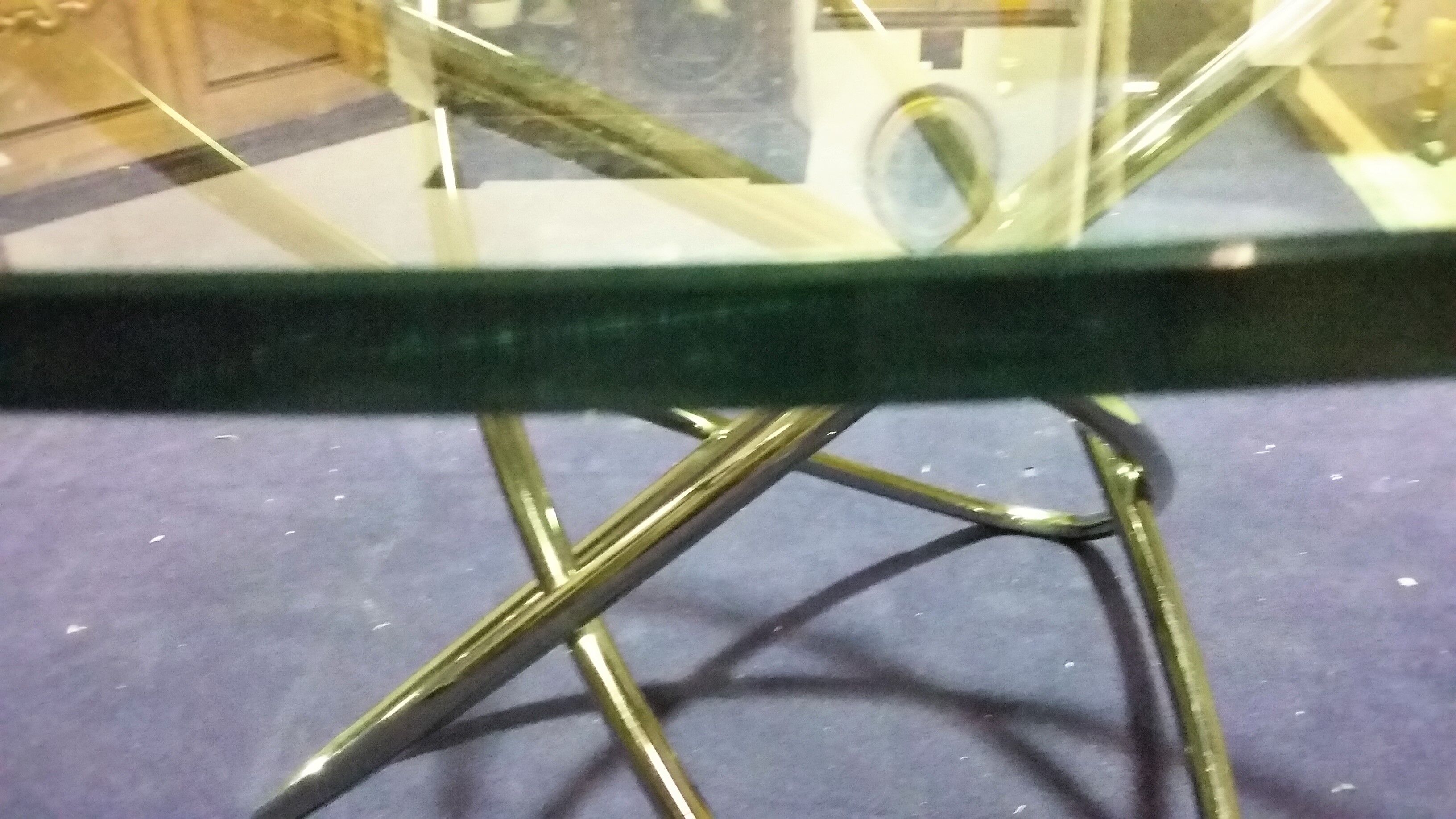 Round table in chrome and glass