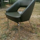 Vintage conference armchair in green skai Roset SNA
