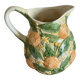 Orange slipware pitcher