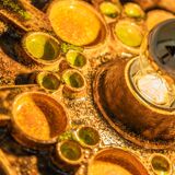 Sputnik wall lamp in brown and orange ceramic, Germany, 1970s.