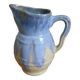 Pastel blue pitcher signed