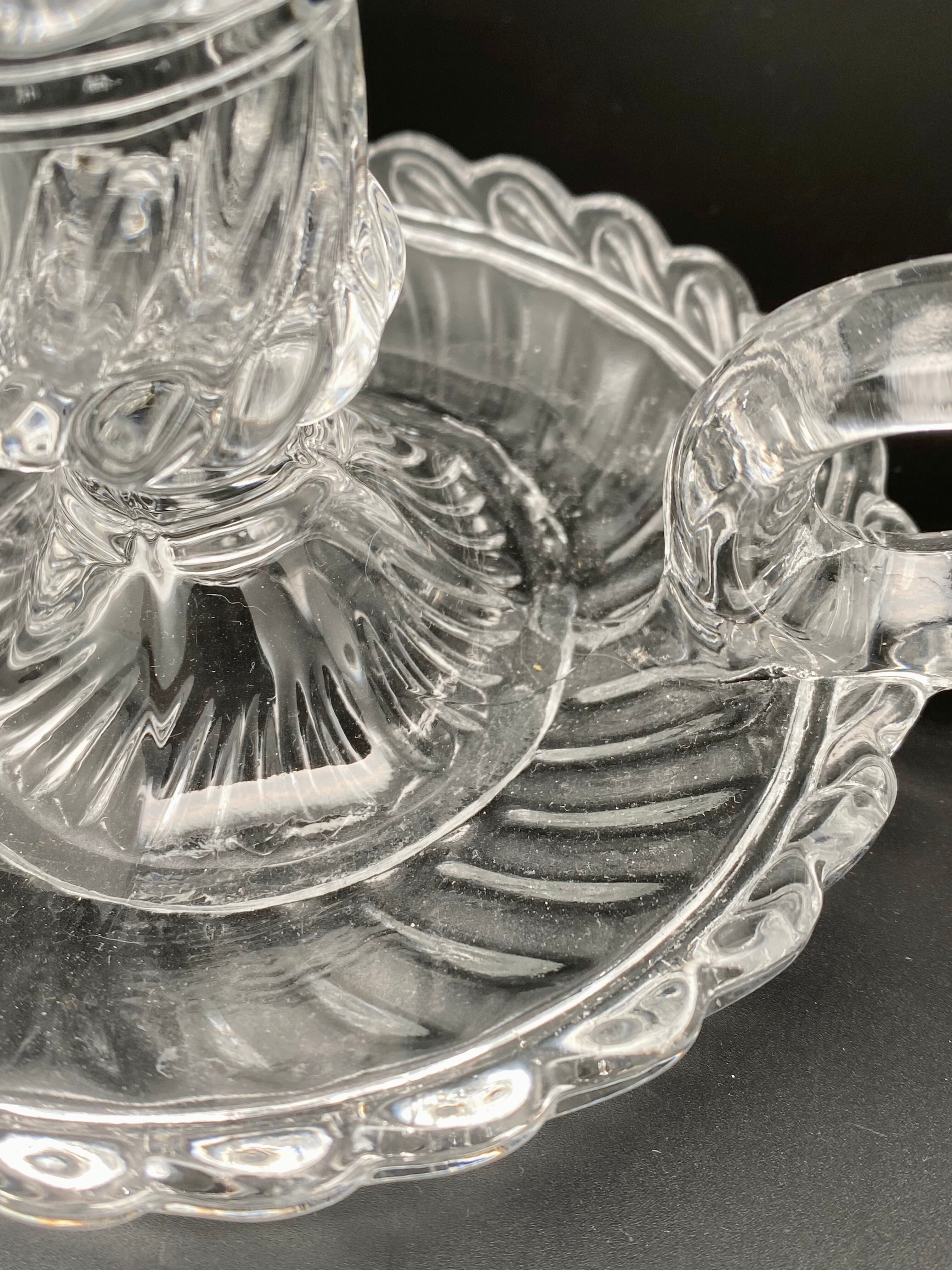 Candle holder with cup and handle in worked glass