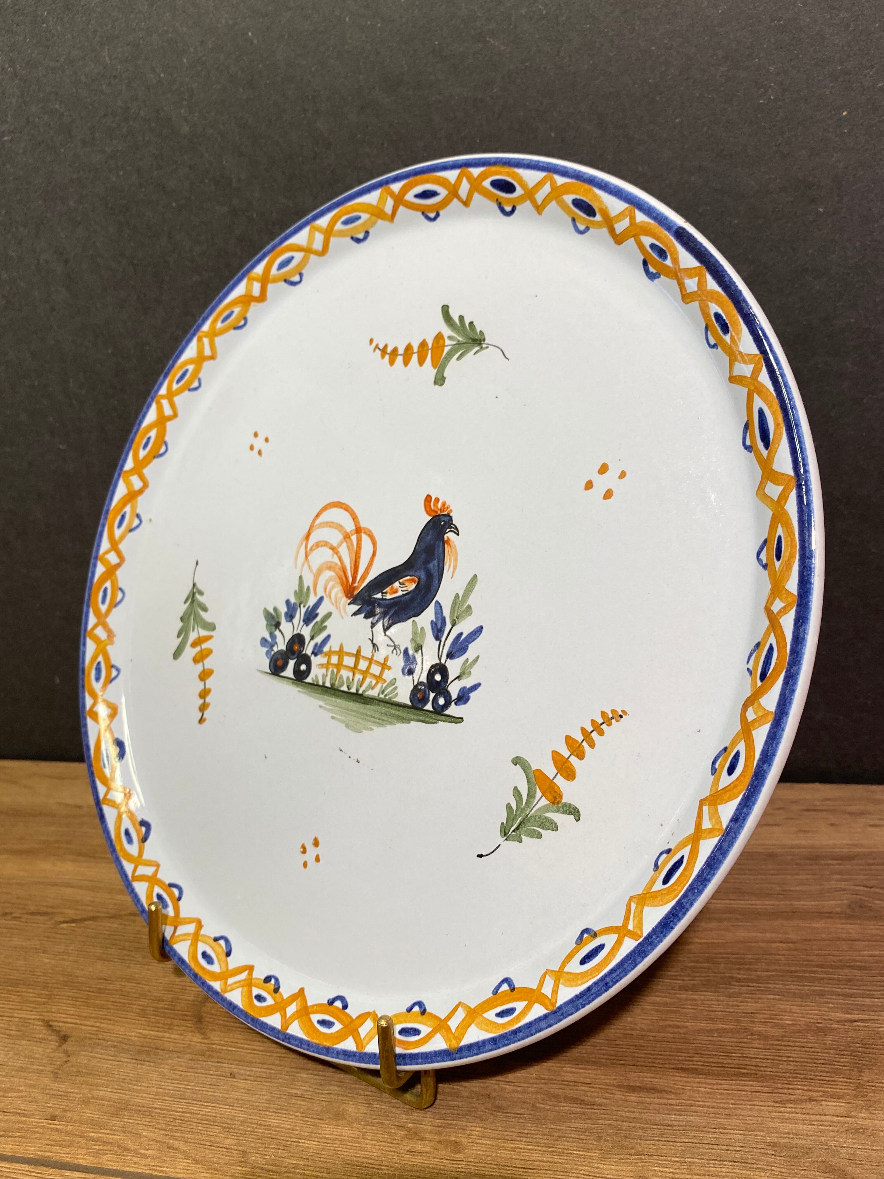 Circular earthenware top signed Bavent, rooster decoration