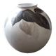 Vintage vase with plant decoration