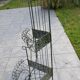 Corner shelf/plant stand in wrought iron and rattan