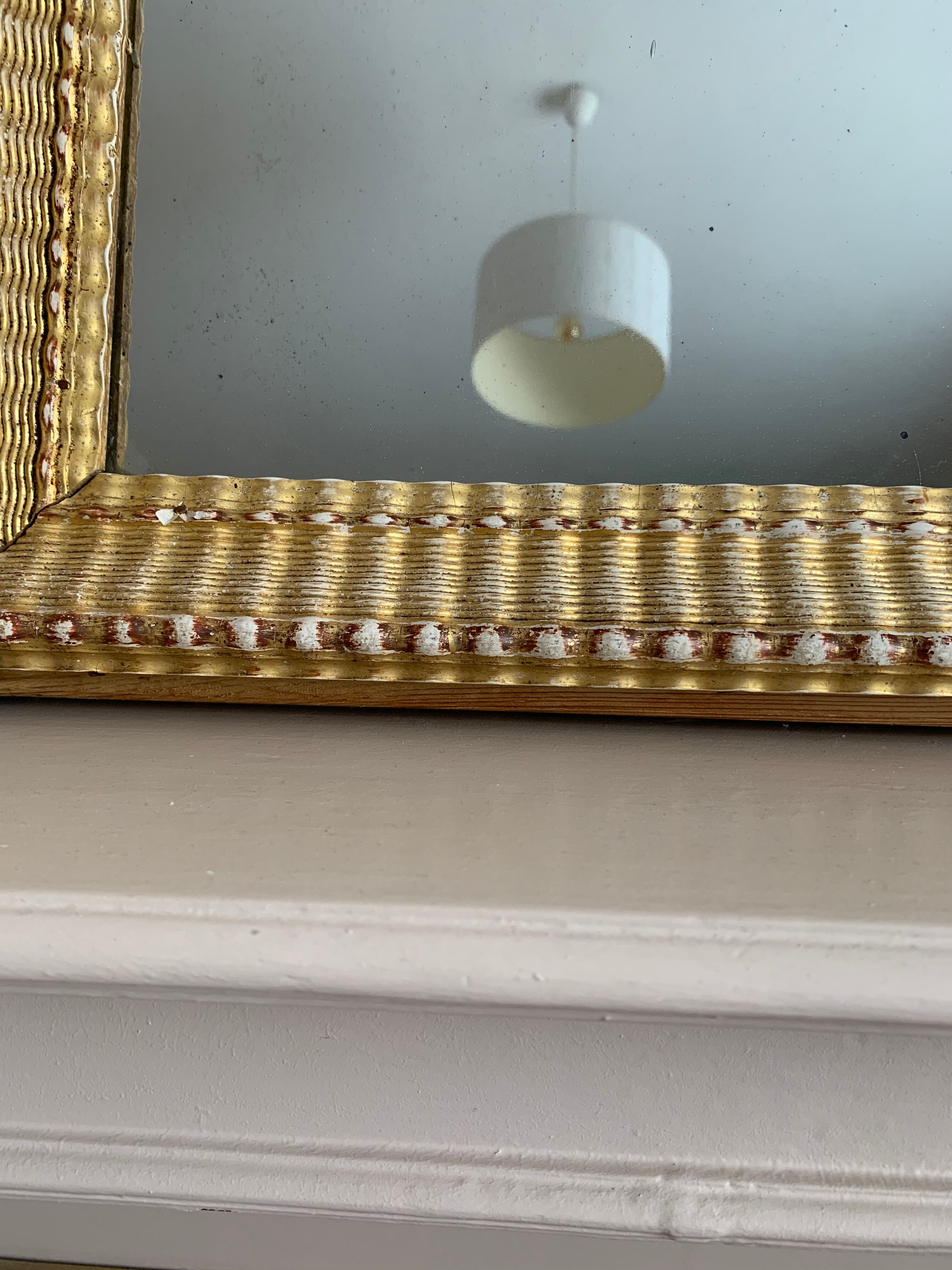 Carved and gilded wooden mirror  44x56cm