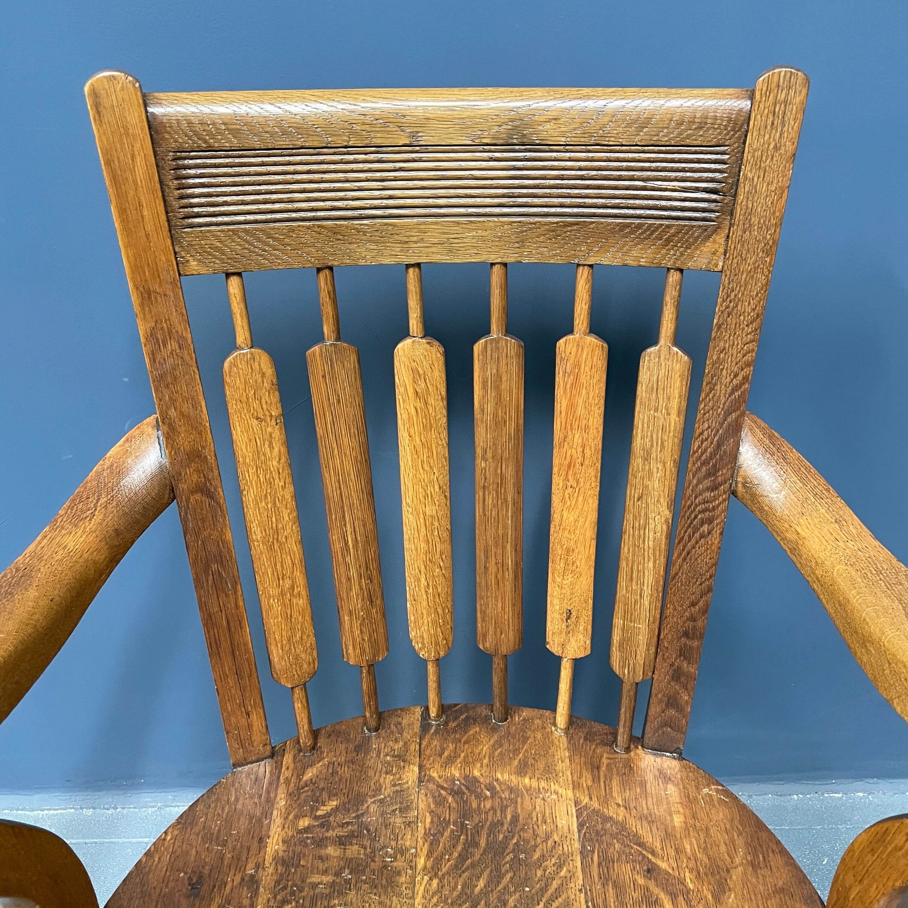 Antique American oak office chair with armrests 1920s