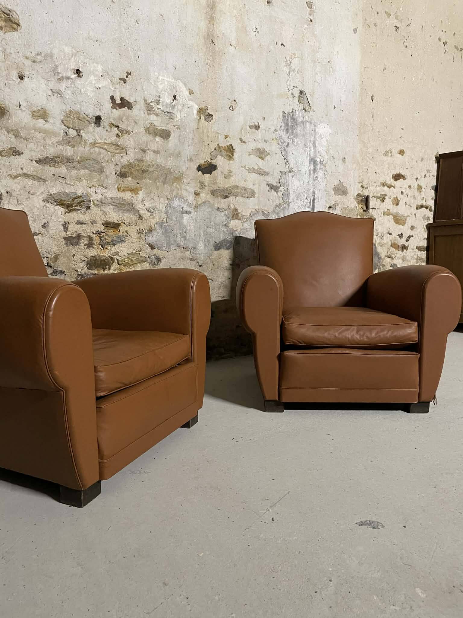 Pair of vintage club style armchairs in camel faux leather.