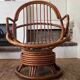 Pair of rotating rattan armchairs