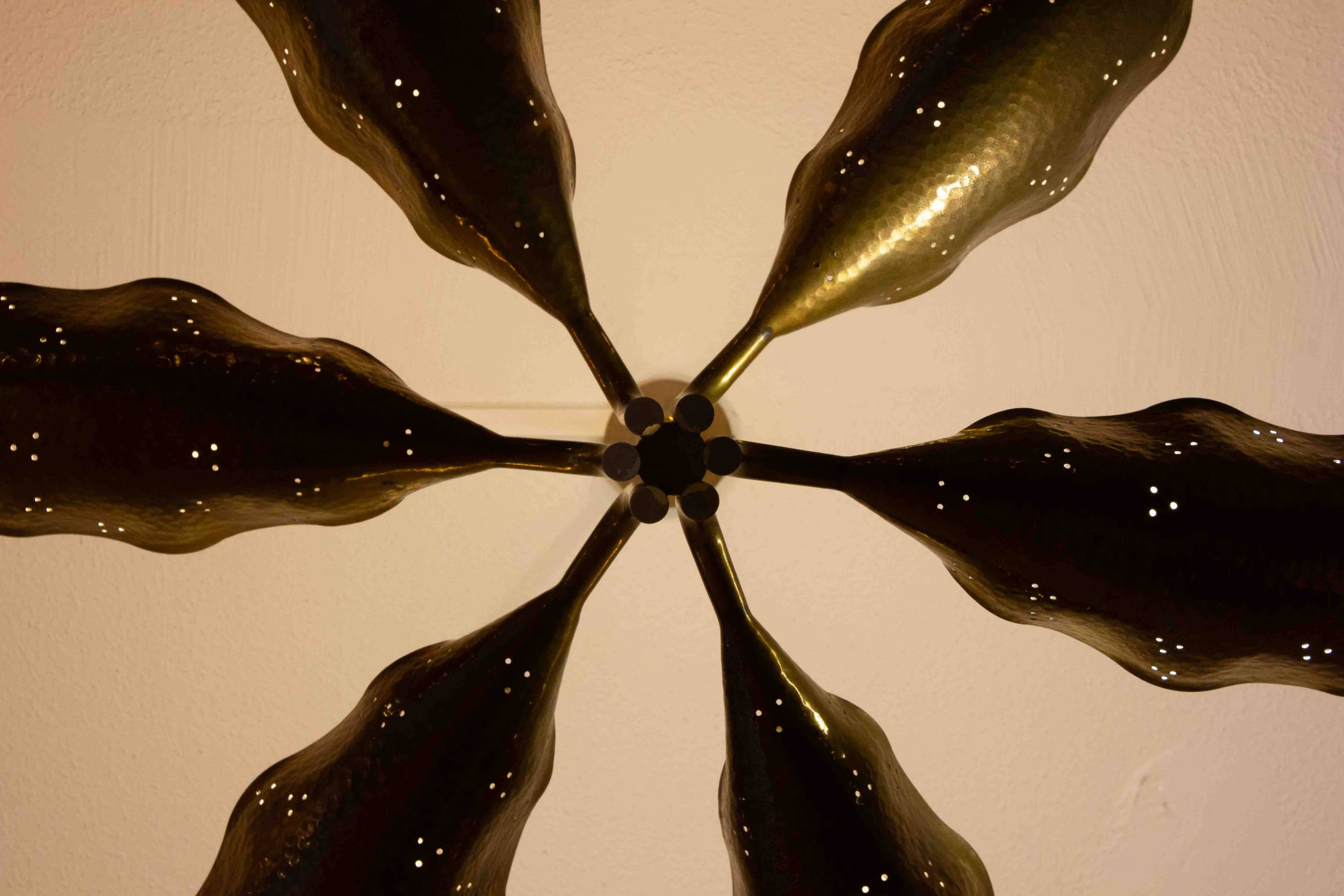 Incredible chandelier with perforated brass leafs by A.  Lelii, Italy 1950s
