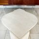 Table basse Roche Bobois forme œil en travertin 1970/80