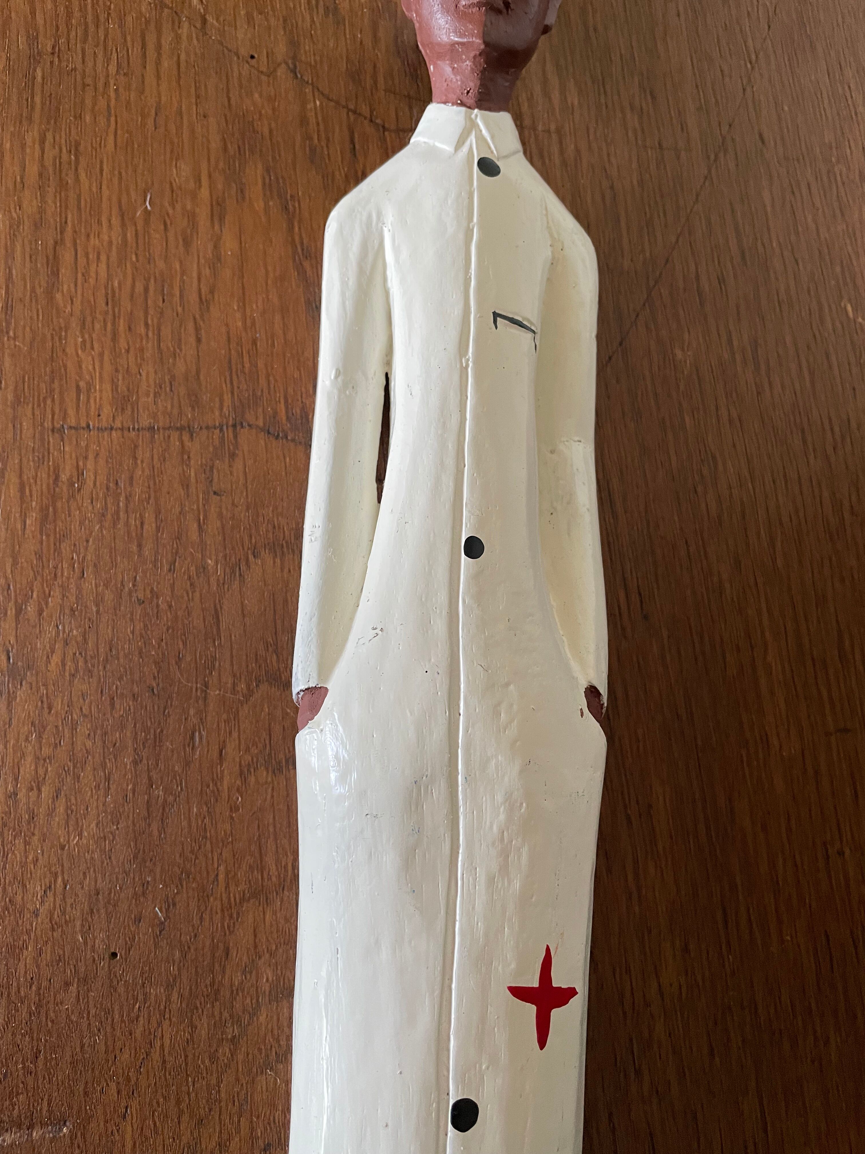 African settler wooden statuette