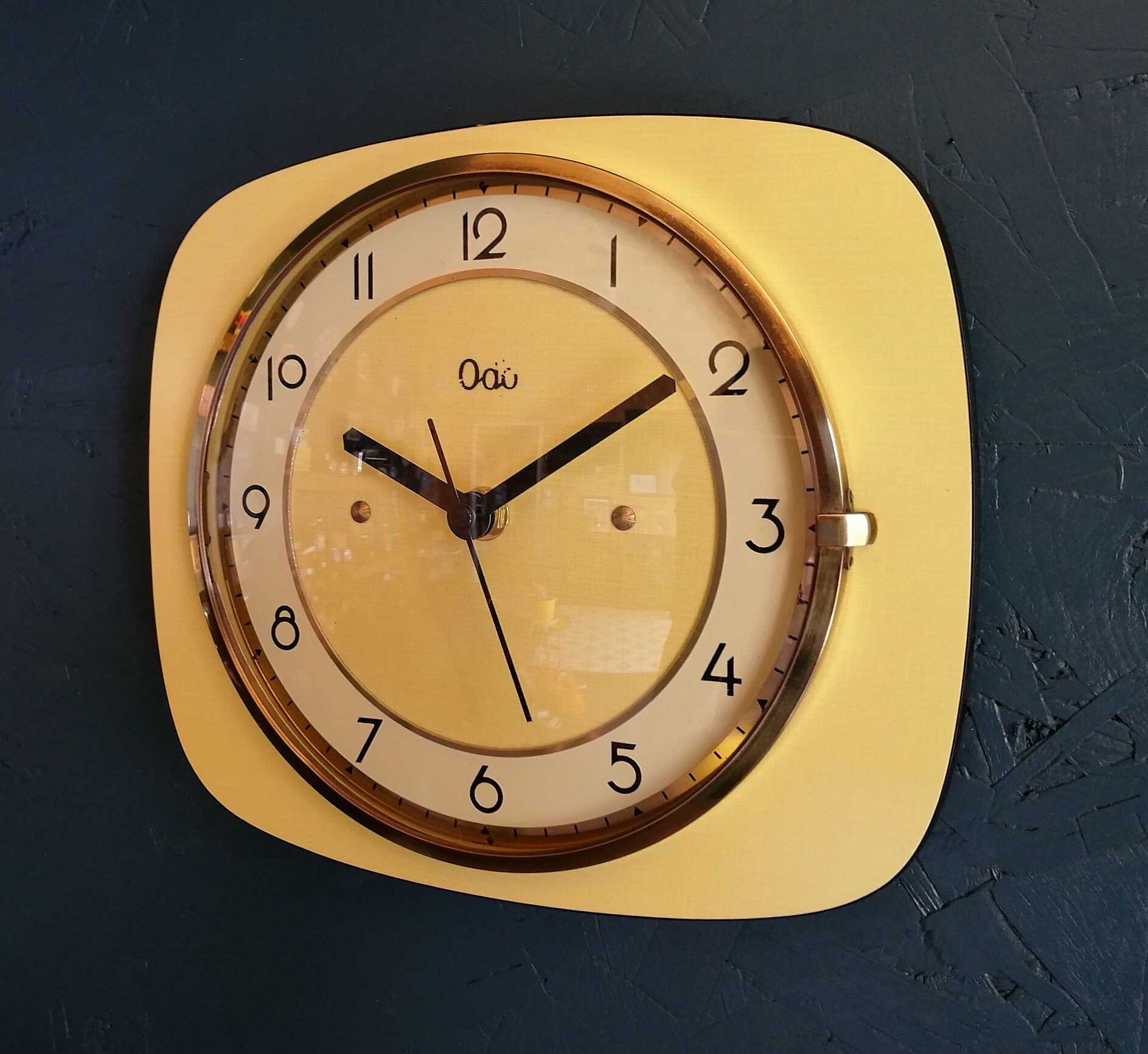 Clock formica vintage silent wall pendulum "Yellow Odo"
