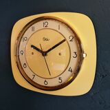 Clock formica vintage silent wall pendulum "Yellow Odo"