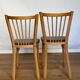 Four chairs Baumann 1960 with bars seated skaï brown label