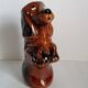 Zoomorphic dachshund dog pitcher in majolica slip