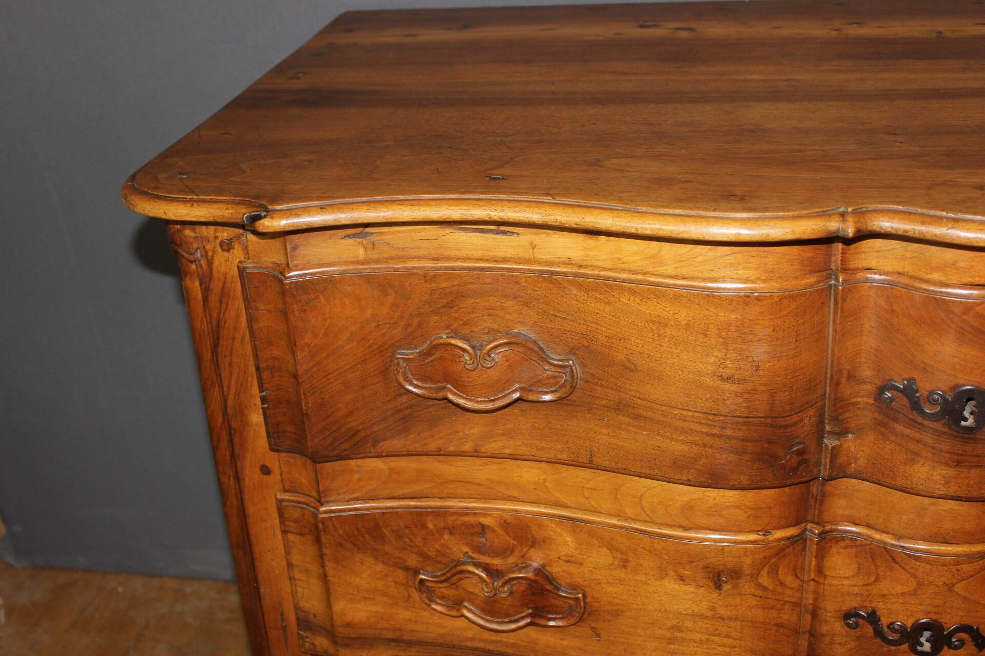 Eighteenth-century walnut crossbow commode.