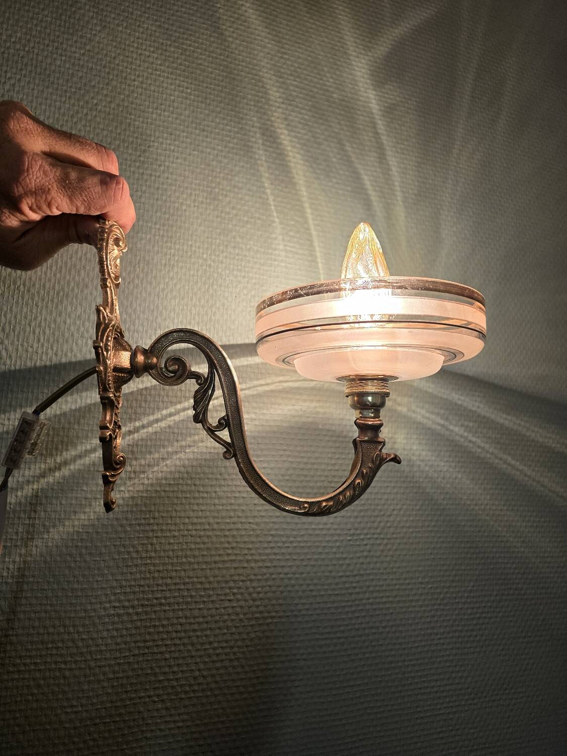 Brass wall sconces and Czechoslovak Art Deco globes