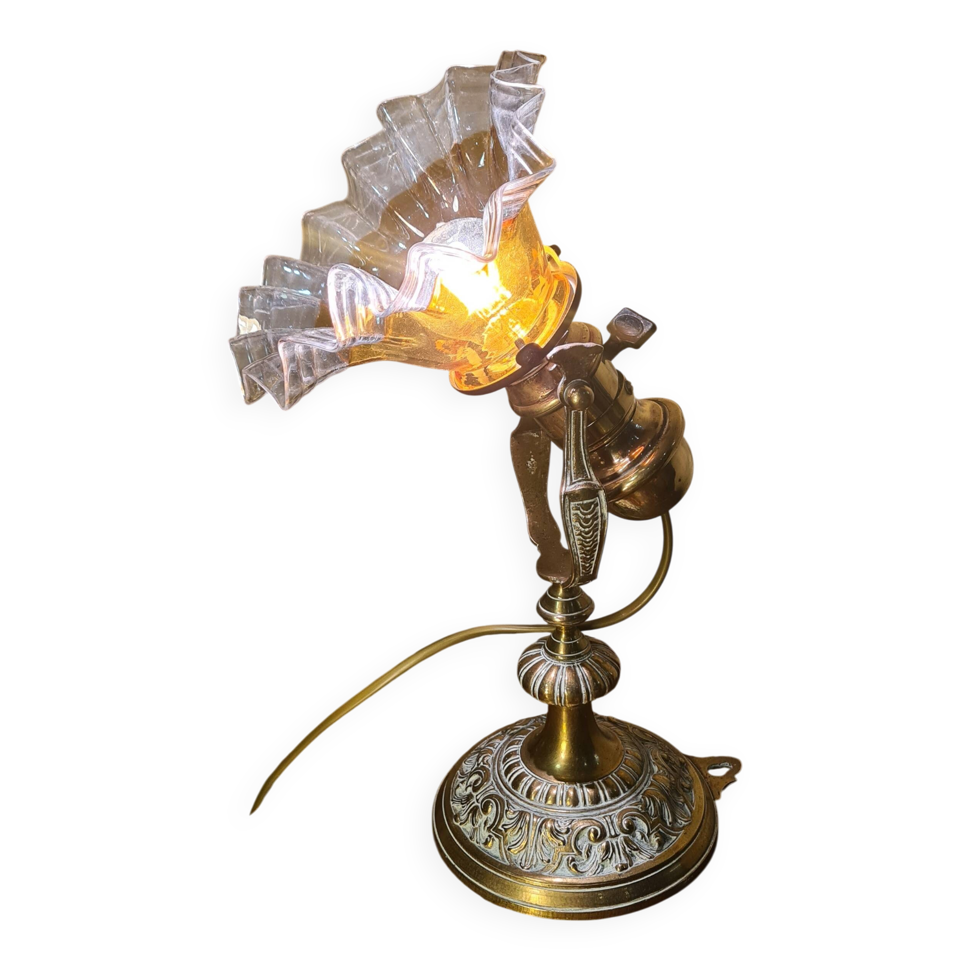 1920 bronze and brass rocking lamp with translucent amber-colored shade