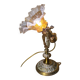 1920 bronze and brass rocking lamp with translucent amber-colored shade