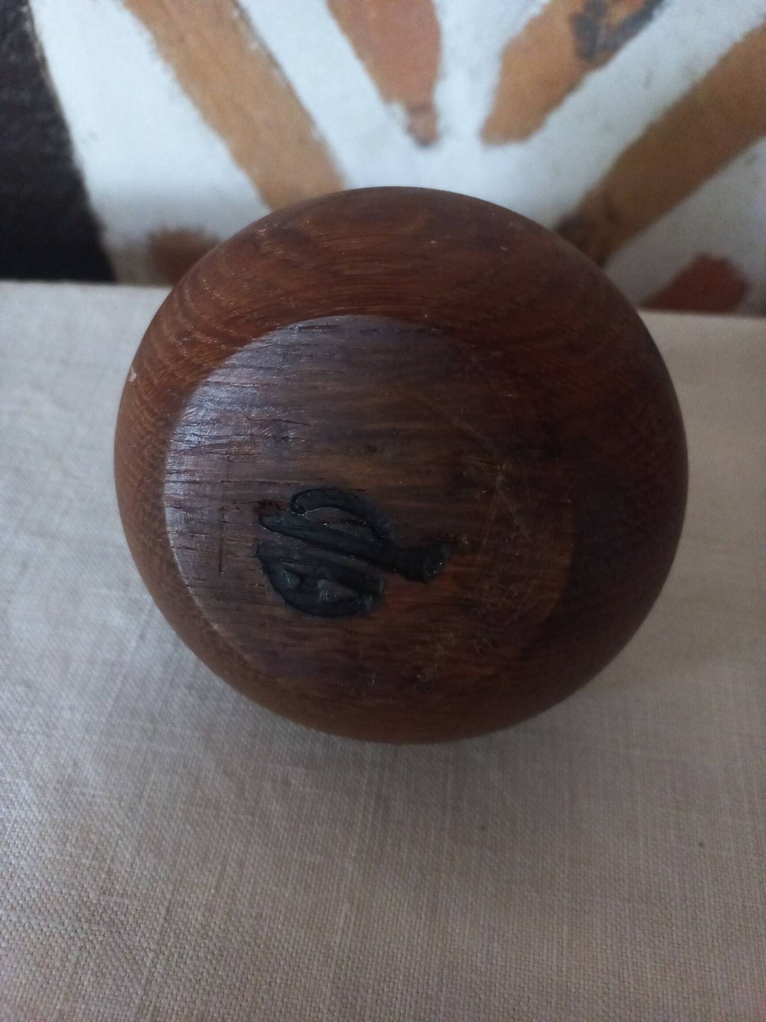 Ball shaped wooden candle holder