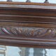 Large mirror beveled Henri II style varnished and carved wooden 128 x 92 cm