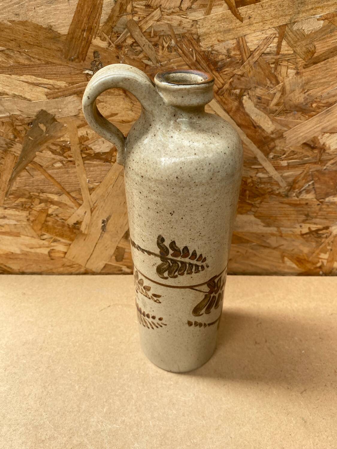 Antique beige enameled ceramic bottle vintage leaf decor