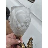 Pair of brass wall lights and glass paste.