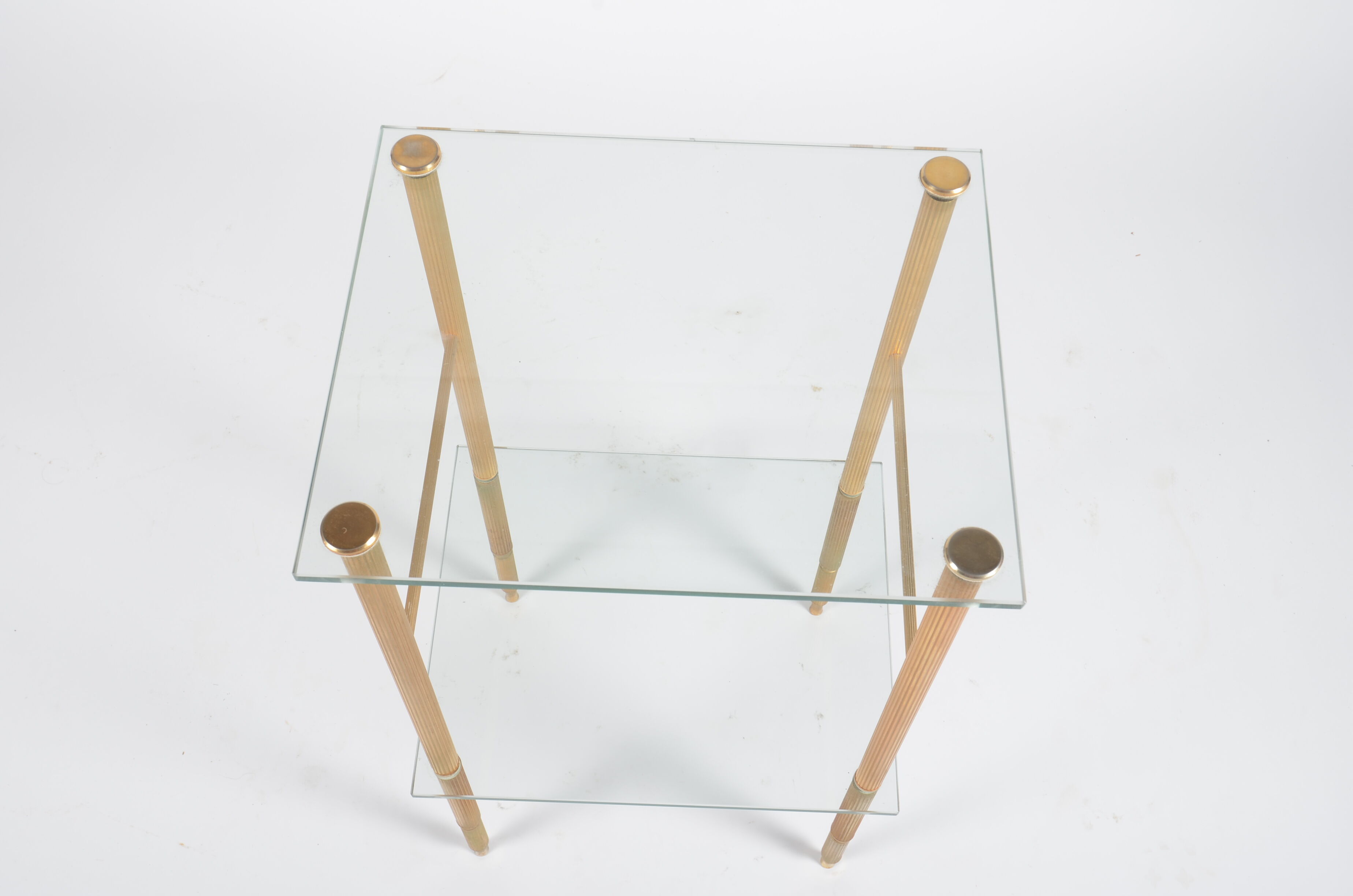 Glass and golden brass side table