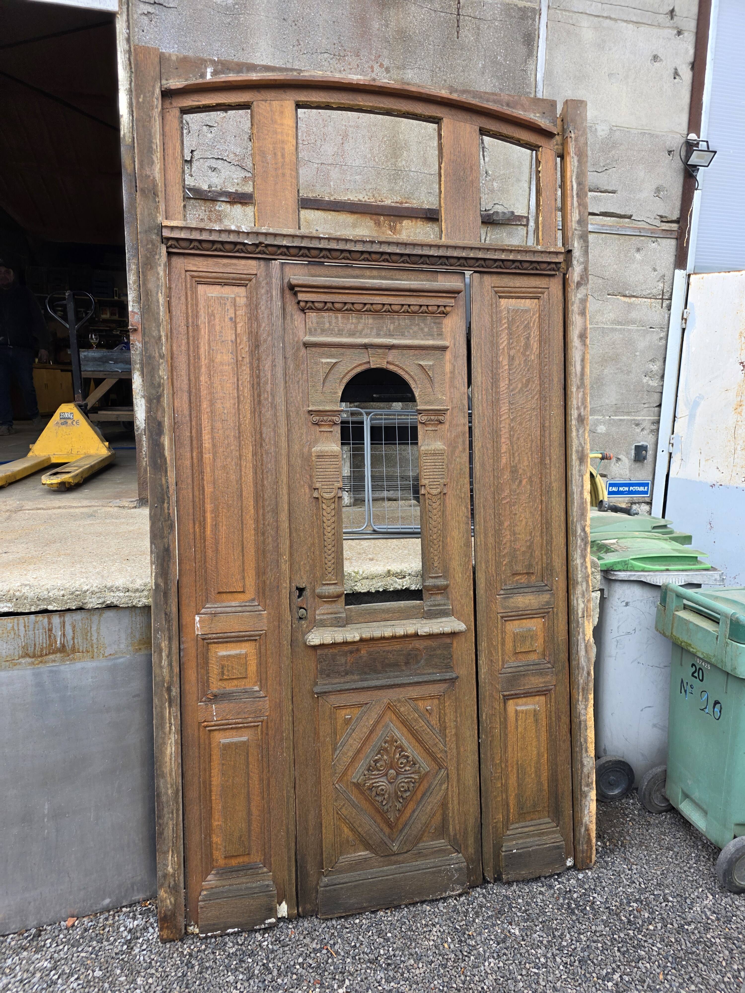 19th-century solid oak entrance door with three openings, including frame.
