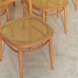 Set of 10 Bystrice tone wooden and caned chairs from the 1960s.