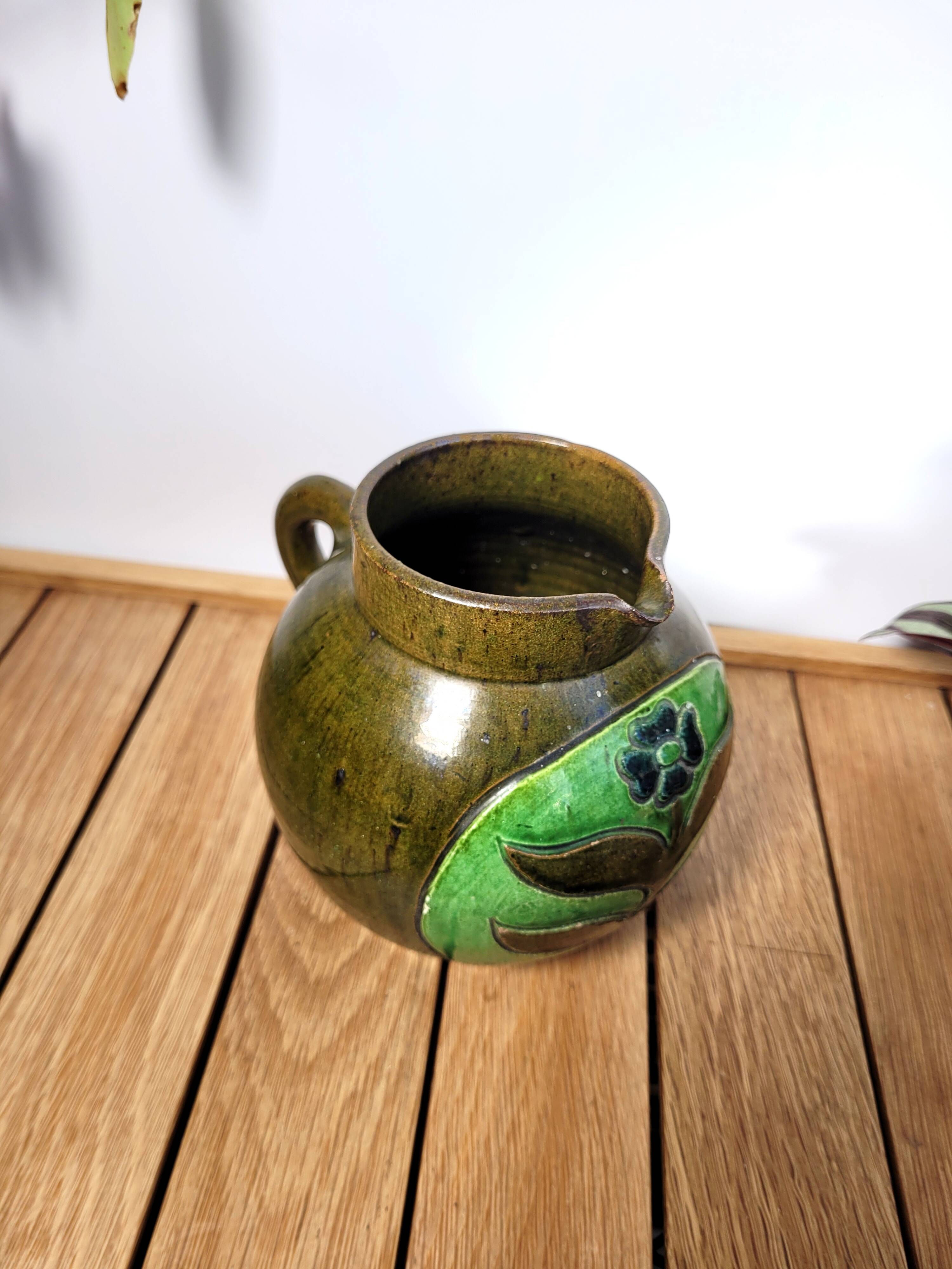 Vintage artisanal flowery ceramic pitcher vase