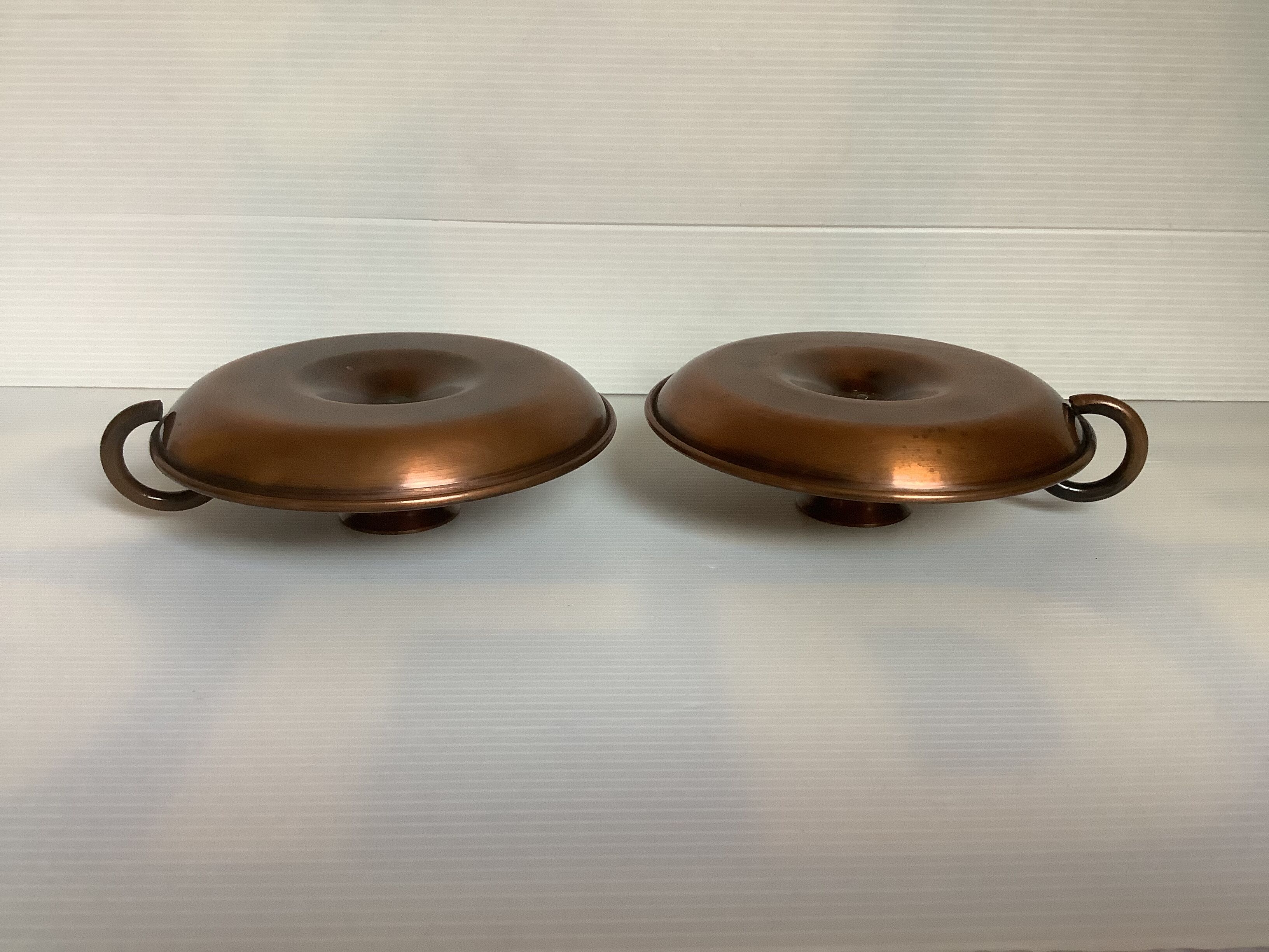 Pair of old copper candlesticks, rat of the cellar.