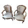 2 fauteuils cabriolet de style Louis XV en cuir crème
