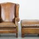 Sheepskin wing chair + XXL patinated footrest
