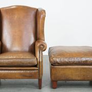 Sheepskin wing chair + XXL patinated footrest