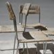 Four straw-seated chairs from 1980.