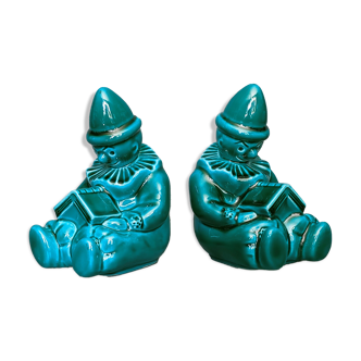 Pair of Art-Deco BookEnd Clowns drowsy in front of a book - glazed ceramics - 1930/1940