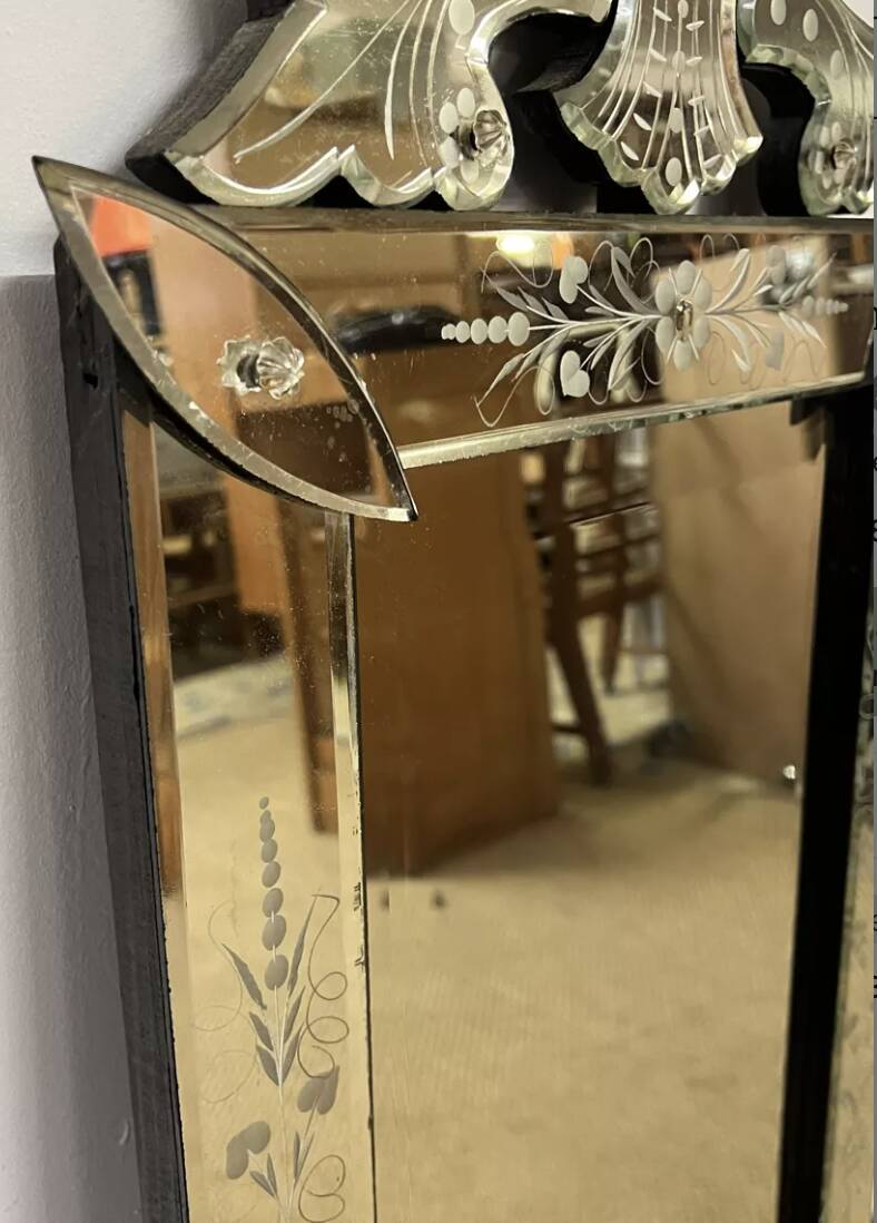 Venetian mirror with floral decoration pediment