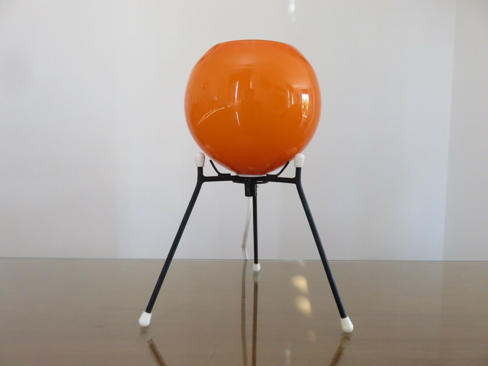 Tripod lamp "Sputnik" in orange opaline and black lacquered metal 60s 70s