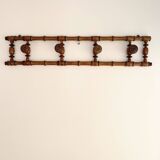 Vintage wooden wall coat rack with 4 swivel hooks from 1920