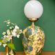 Vintage table lamp with floral decorations and white opaline.